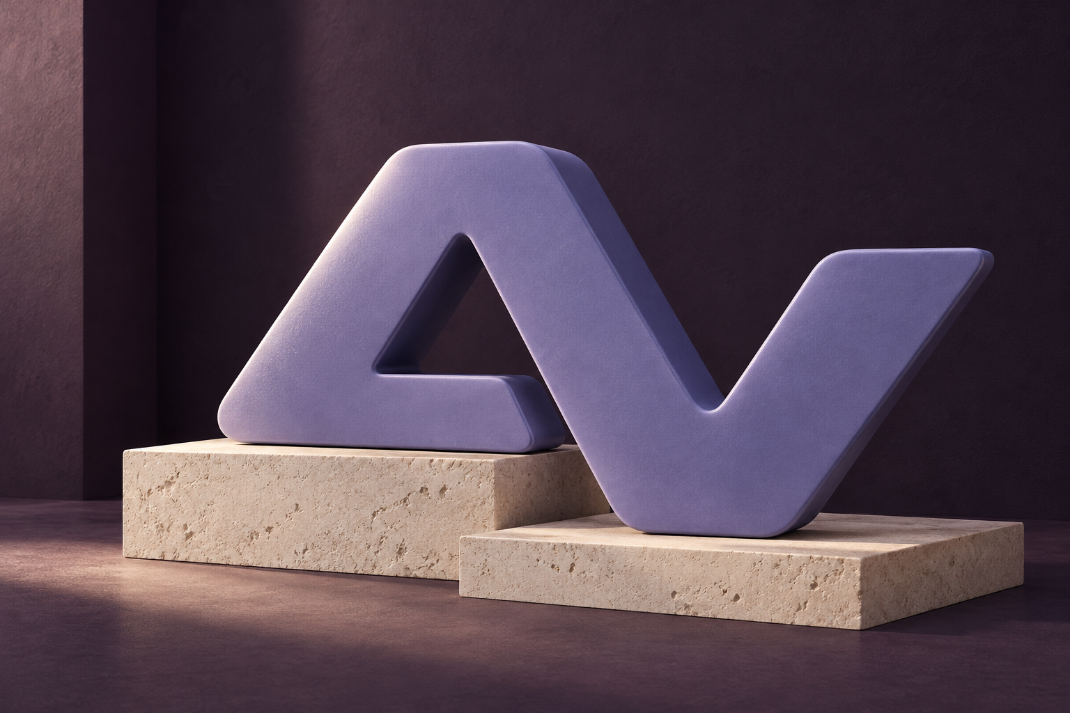 The Avmere symbol as a periwinkle sculpture on limestone